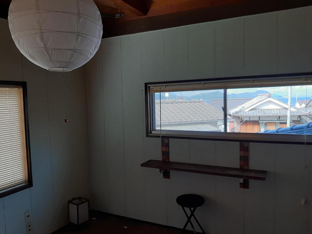 Guesthouse Kume Imabari Railway Station Exterior foto